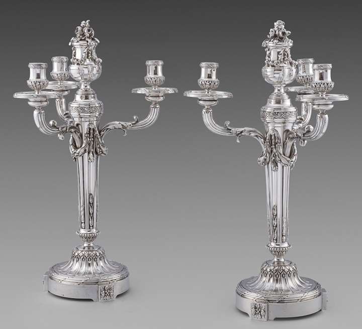 A Pair of French Louis XVI Style Three Light Candelabra